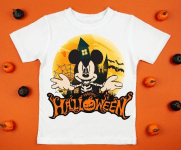 White womens cotton t-shirt halloween mockup with pumpkins on orange background. Design t shirt template, print presentation mock up. Top view flat lay.